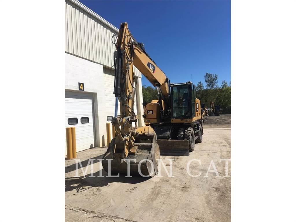 CAT M318F Pelle sur pneus