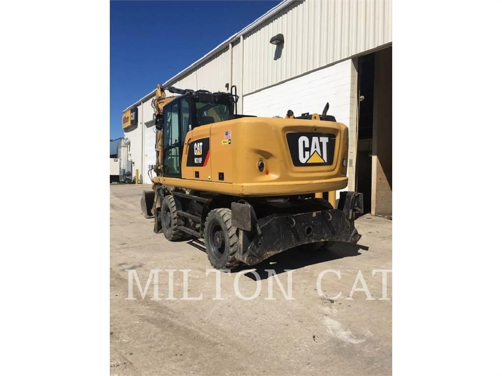 CAT M318F Pelle sur pneus