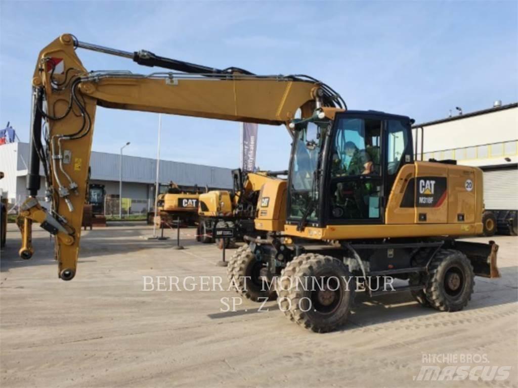 CAT M318F Pelle sur pneus