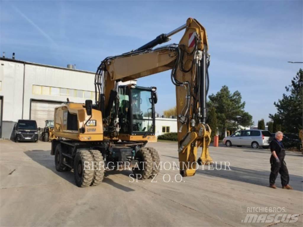 CAT M318F Pelle sur pneus