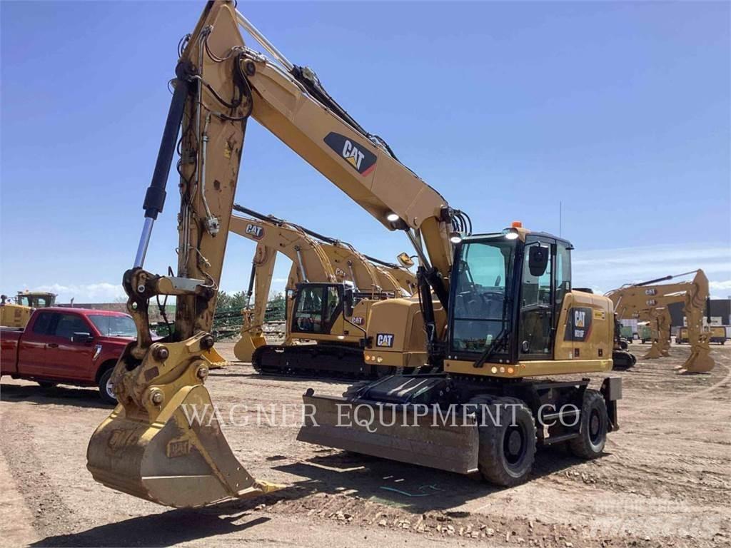 CAT M318F Pelle sur pneus