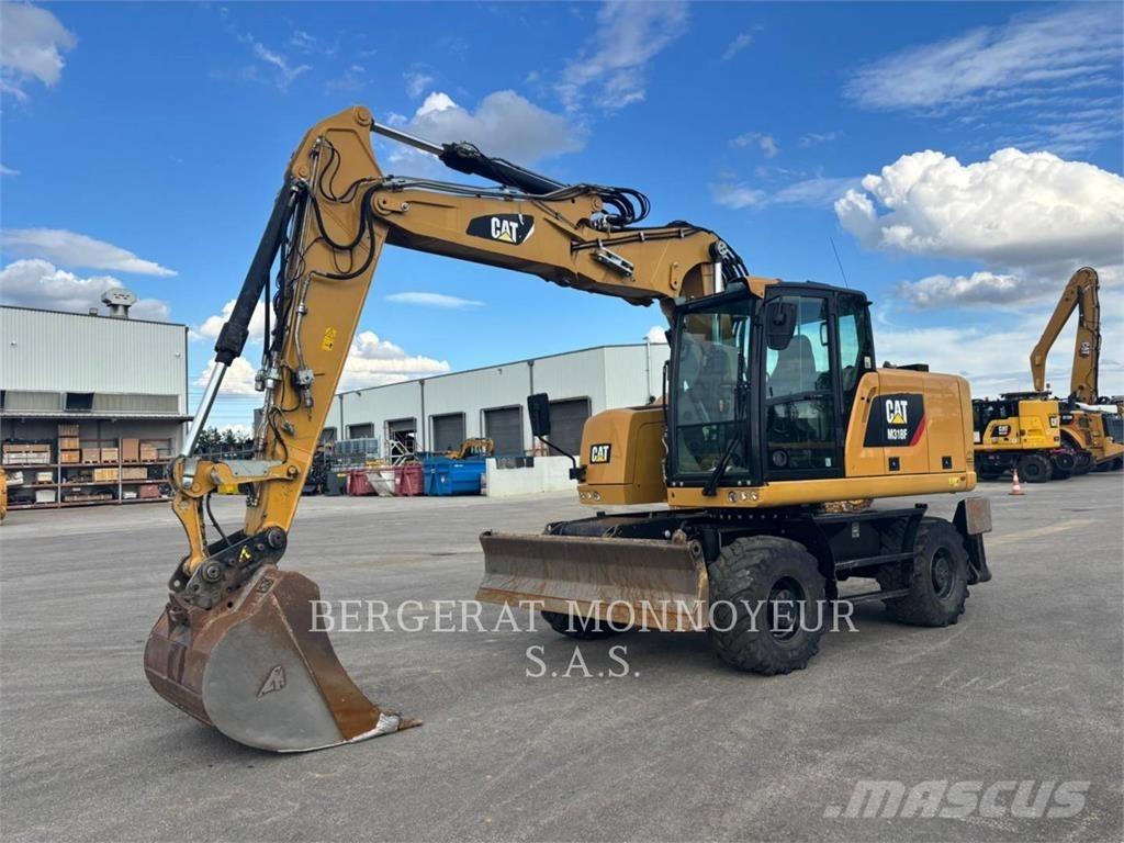 CAT M318F IVC Pelle sur pneus