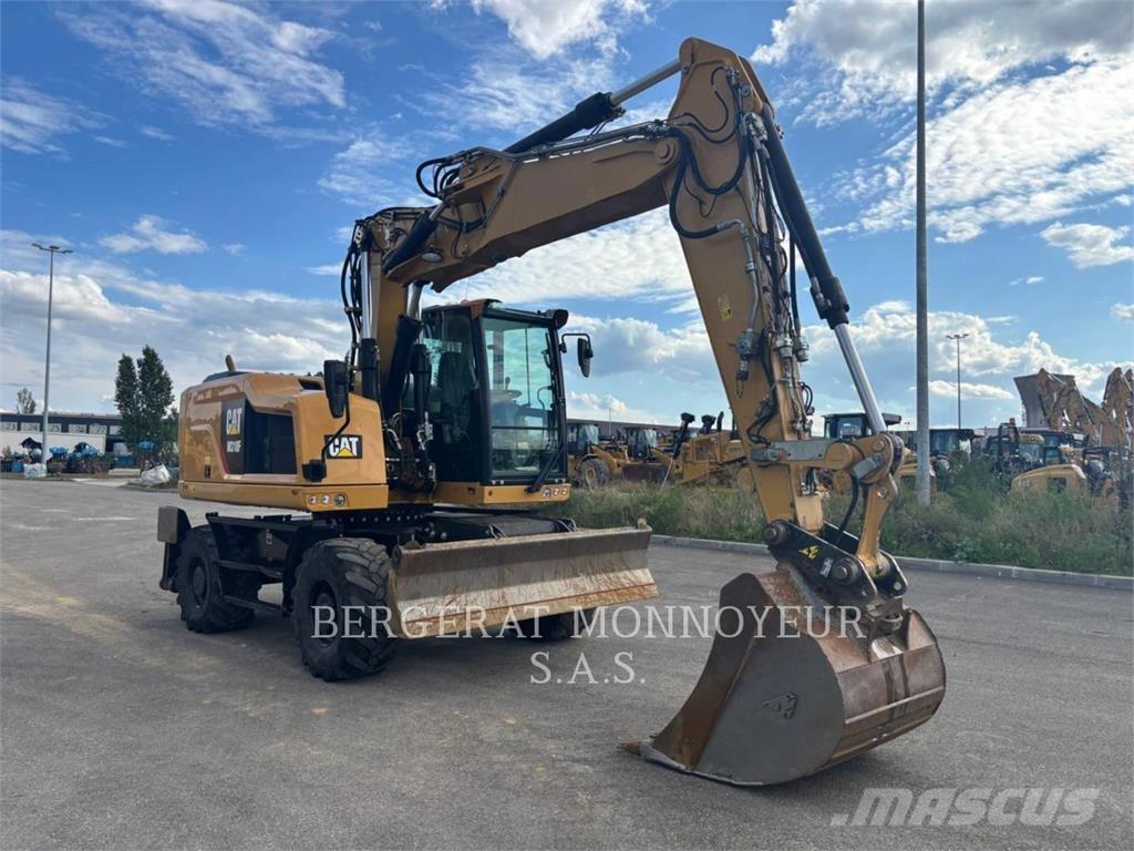 CAT M318F IVC Pelle sur pneus