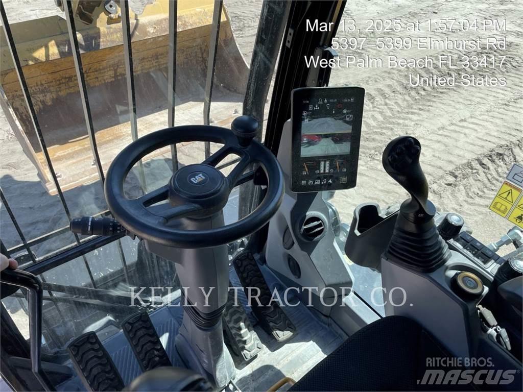 CAT M320 Pelle sur pneus