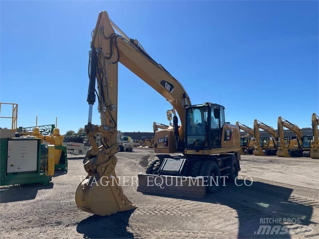 CAT M320F Pelle sur pneus