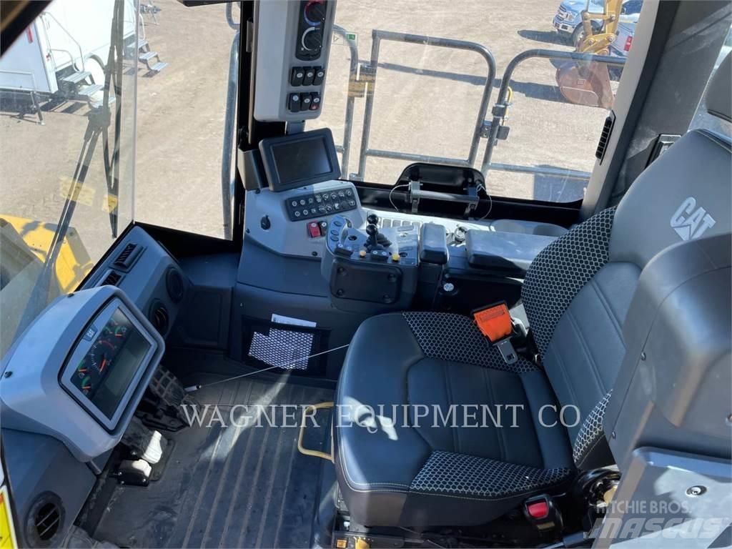 CAT M320F Pelle sur pneus