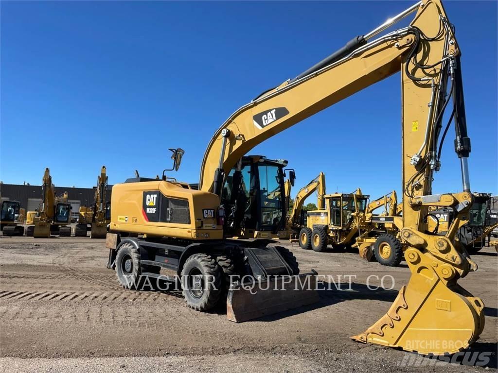 CAT M320F Pelle sur pneus