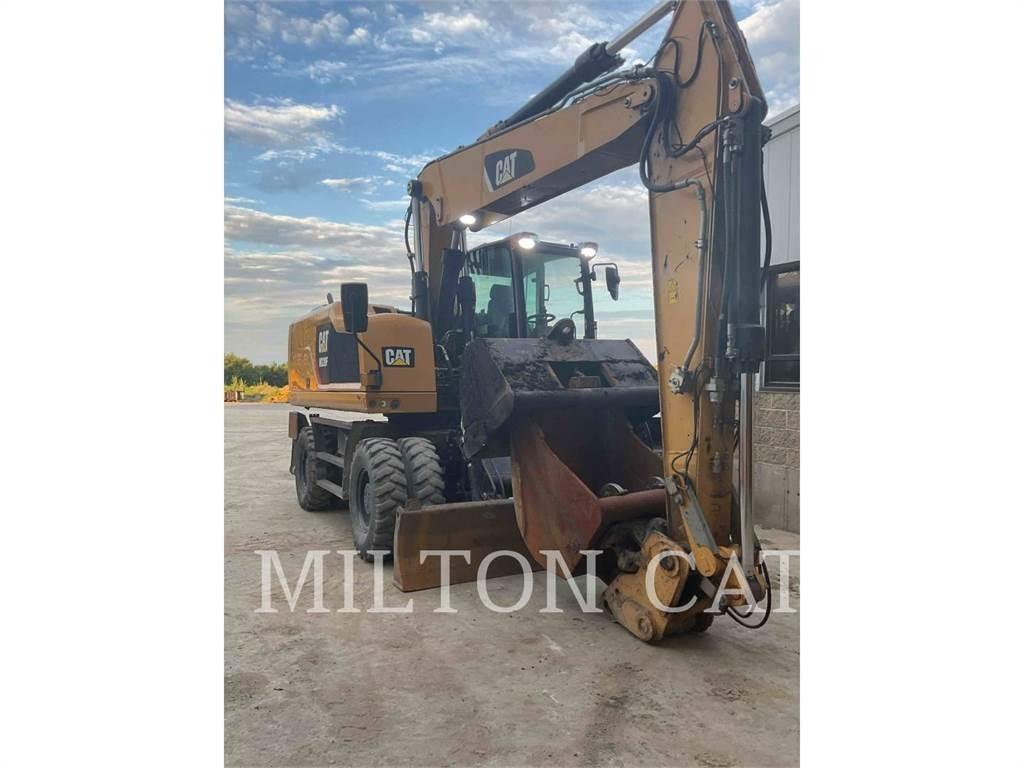 CAT M320F Pelle sur pneus