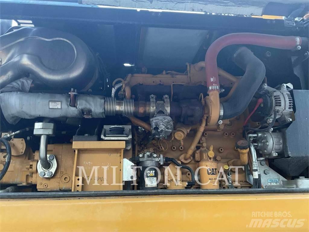 CAT M320F Pelle sur pneus