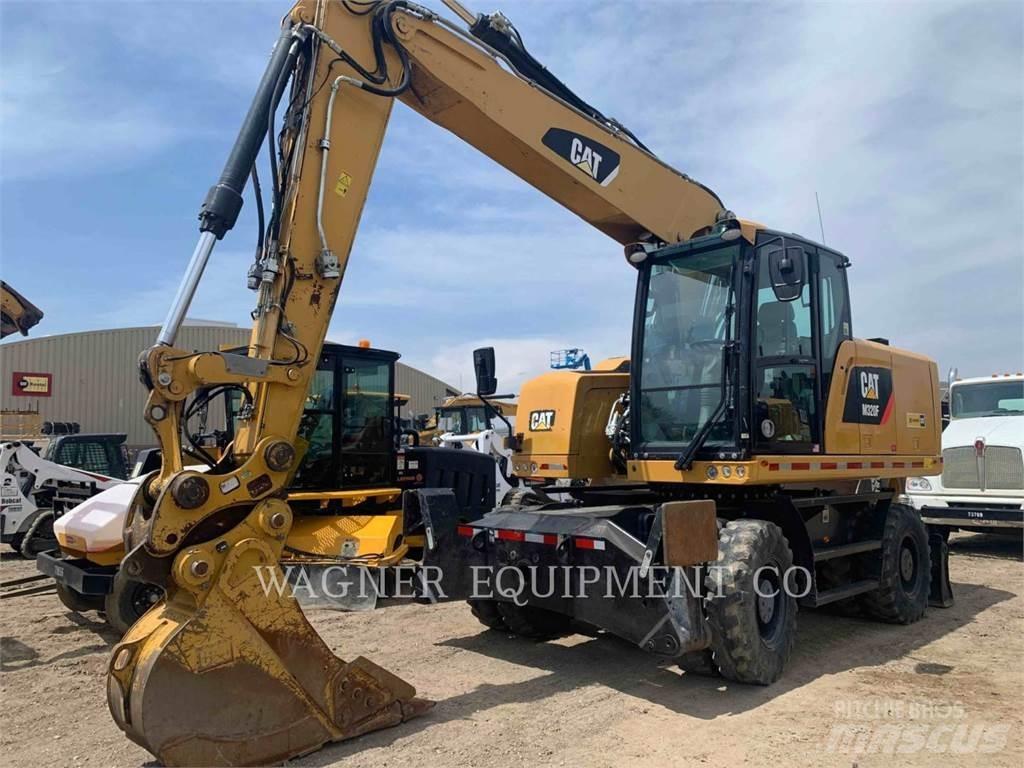 CAT M320F Pelle sur pneus
