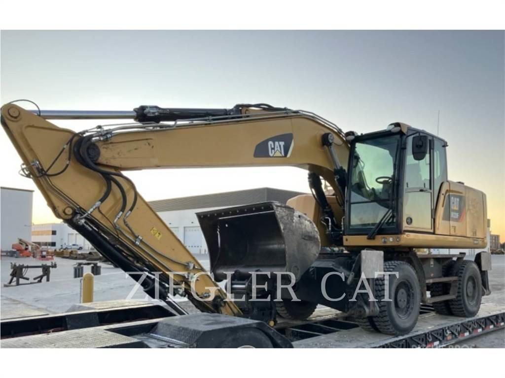CAT M320F Pelle sur pneus