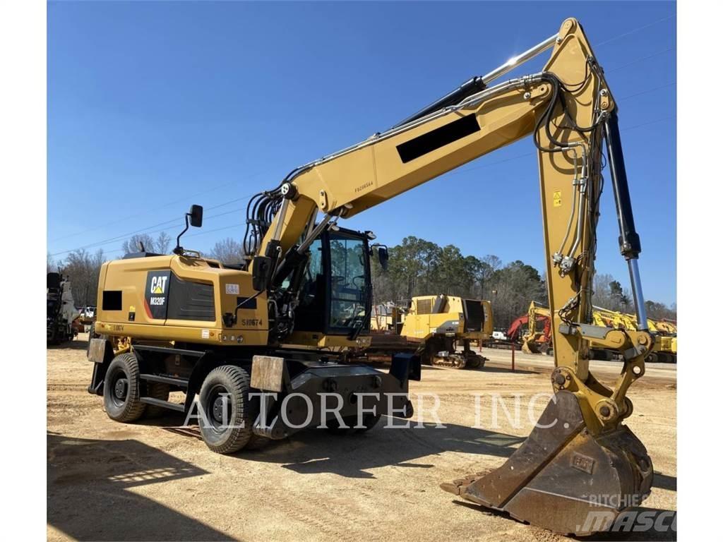 CAT M320F Pelle sur pneus