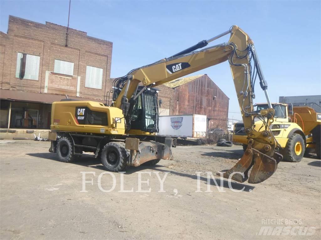 CAT M320F Pelle sur pneus