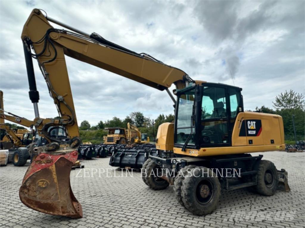 CAT M320F Pelle sur pneus