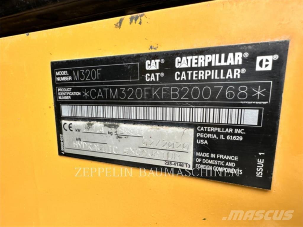CAT M320F Pelle sur pneus