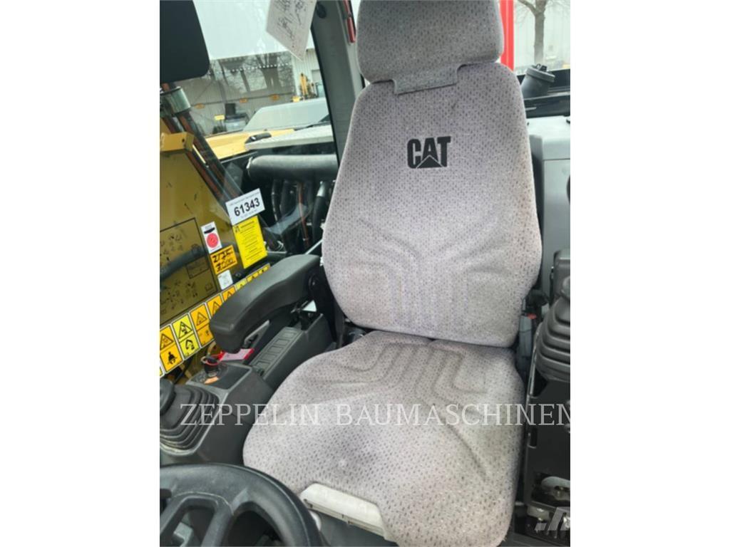 CAT M320F Pelle sur pneus