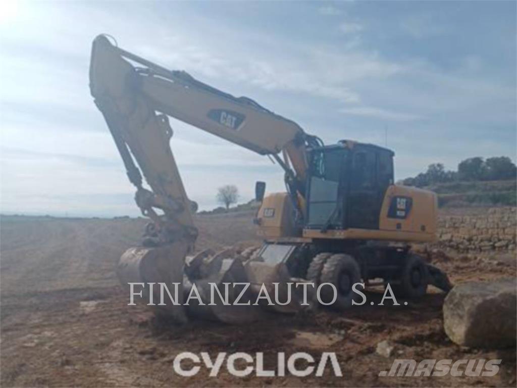 CAT M320F Pelle sur pneus