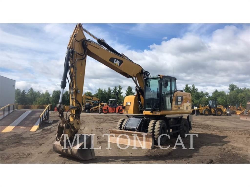CAT M320F Pelle sur pneus