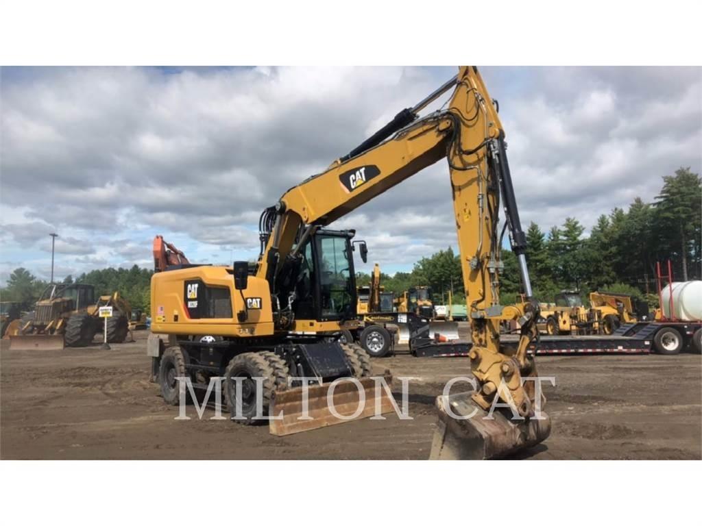 CAT M320F Pelle sur pneus