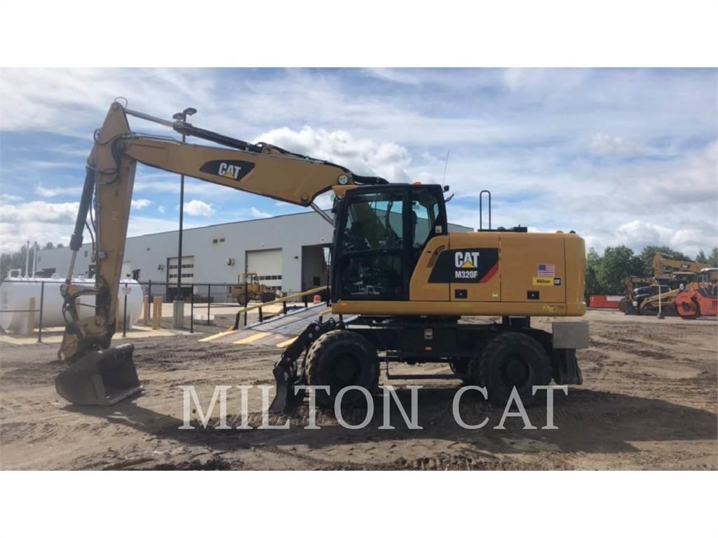 CAT M320F Pelle sur pneus