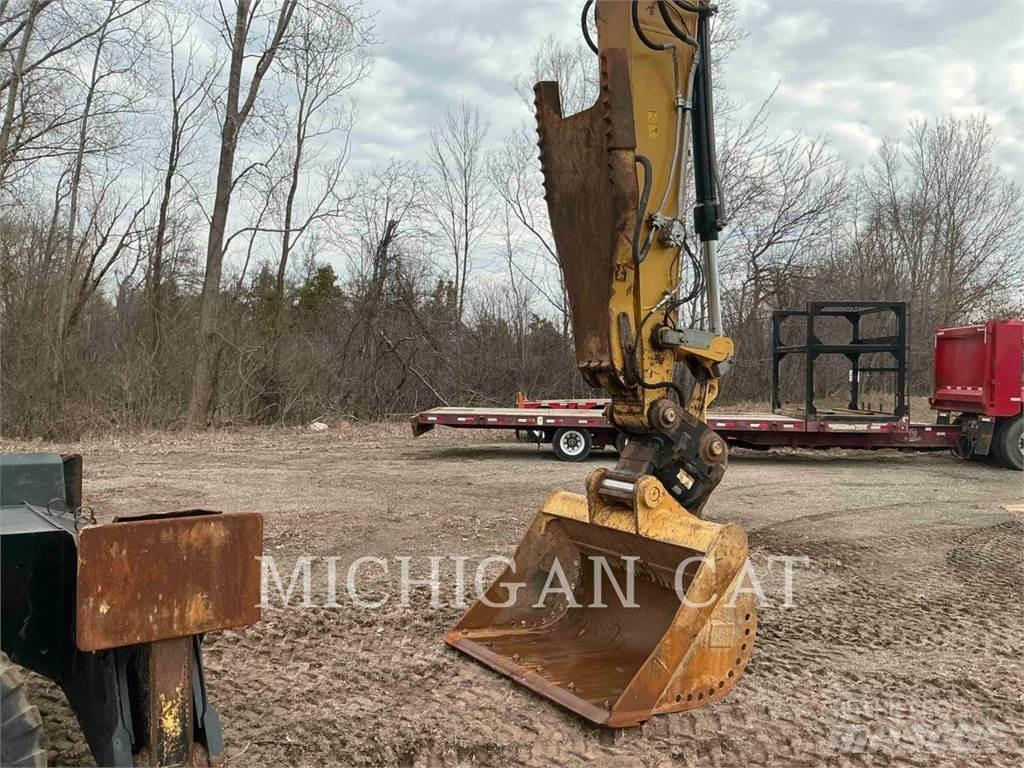 CAT M320F PMTQ Pelle sur pneus