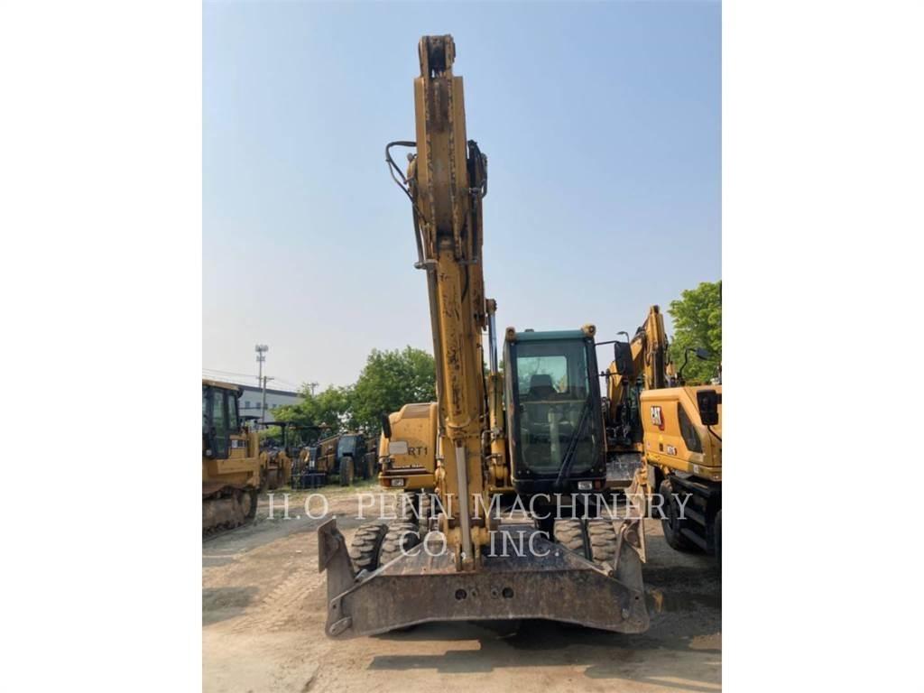 CAT M322C Pelle sur pneus