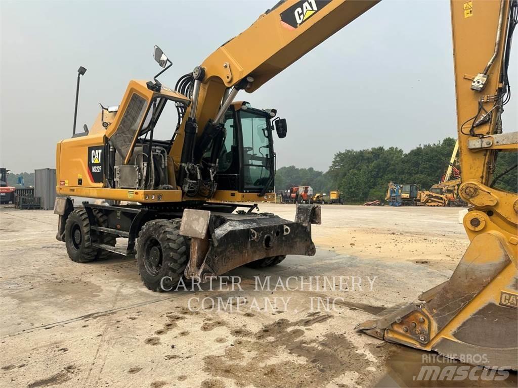 CAT M322F Pelle sur pneus