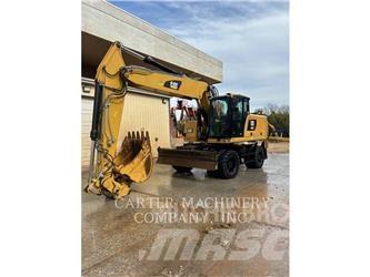 CAT M322F Pelle sur pneus