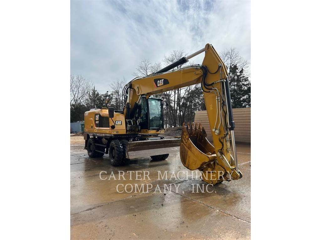 CAT M322F Pelle sur pneus