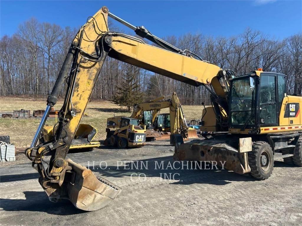 CAT M322F Pelle sur pneus