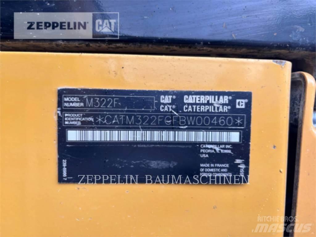 CAT M322F Pelle sur pneus