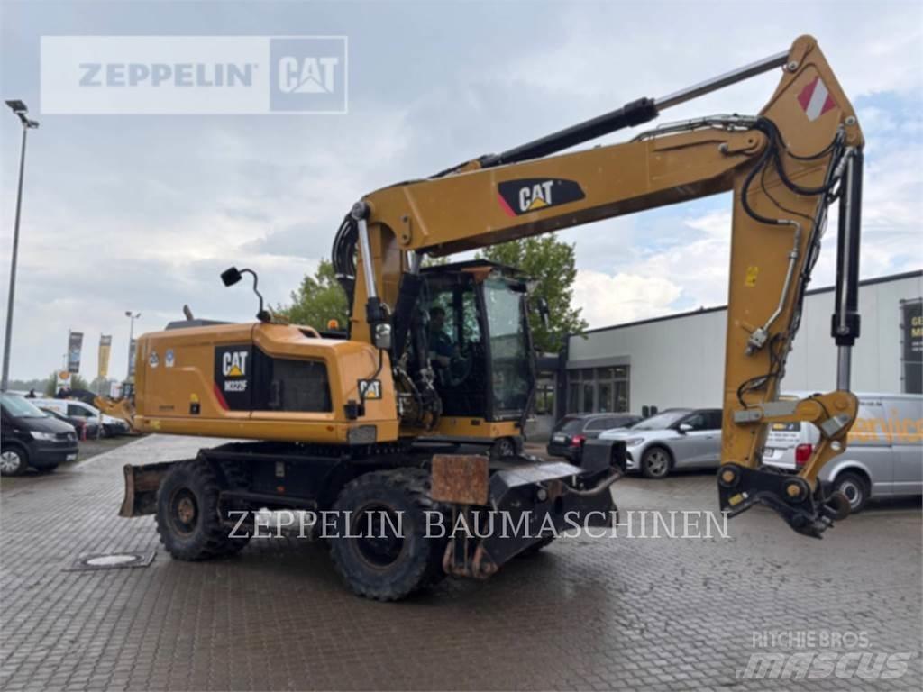 CAT M322F Pelle sur pneus