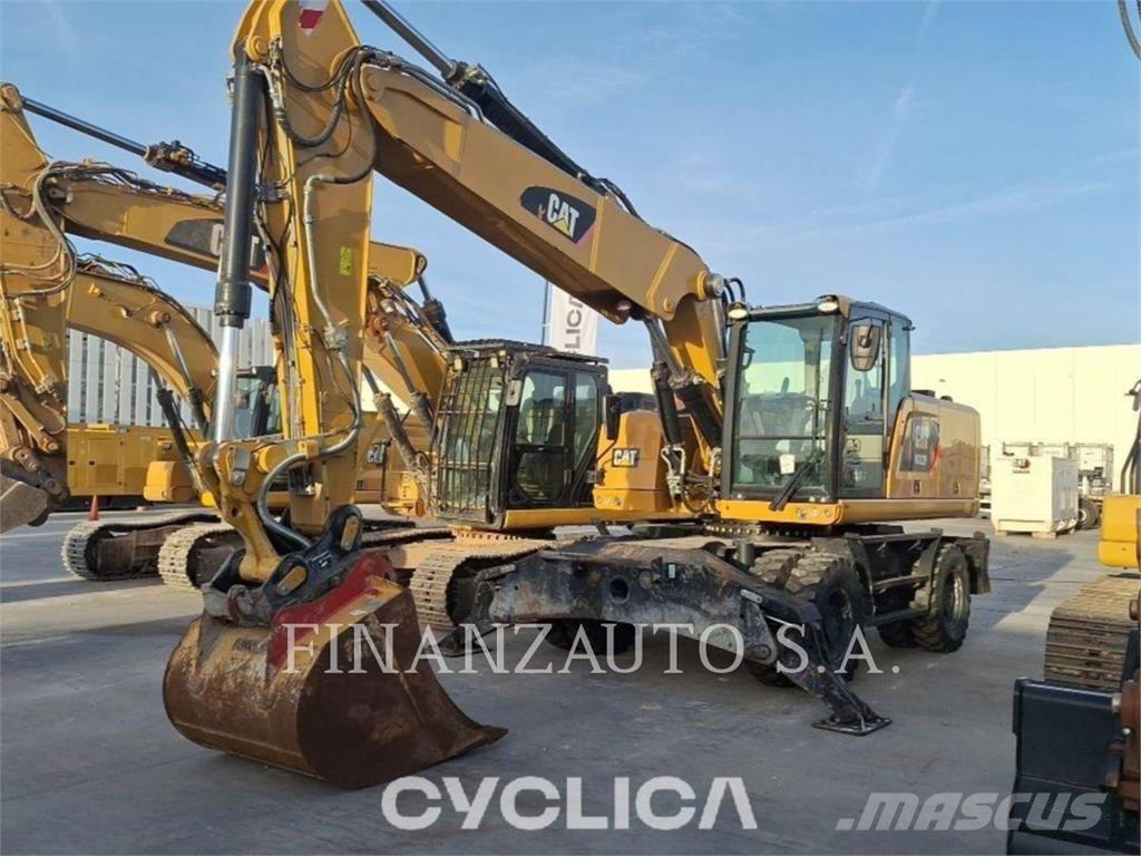 CAT M322F Pelle sur pneus