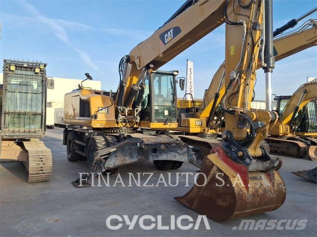 CAT M322F Pelle sur pneus