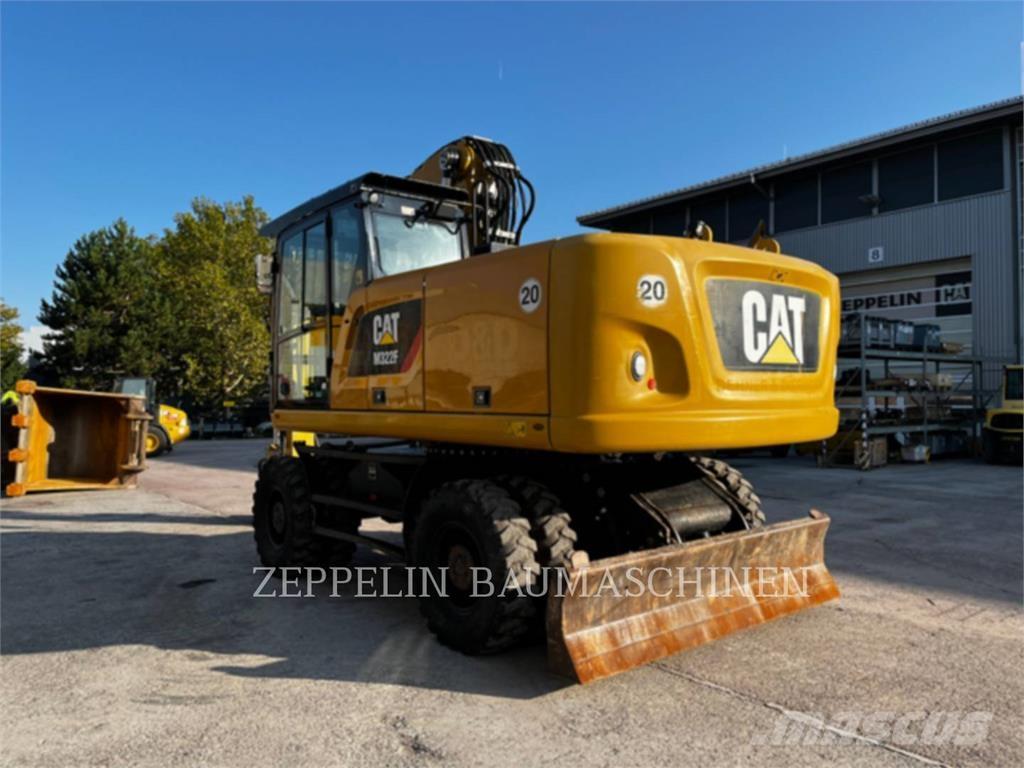 CAT M322F Pelle sur pneus