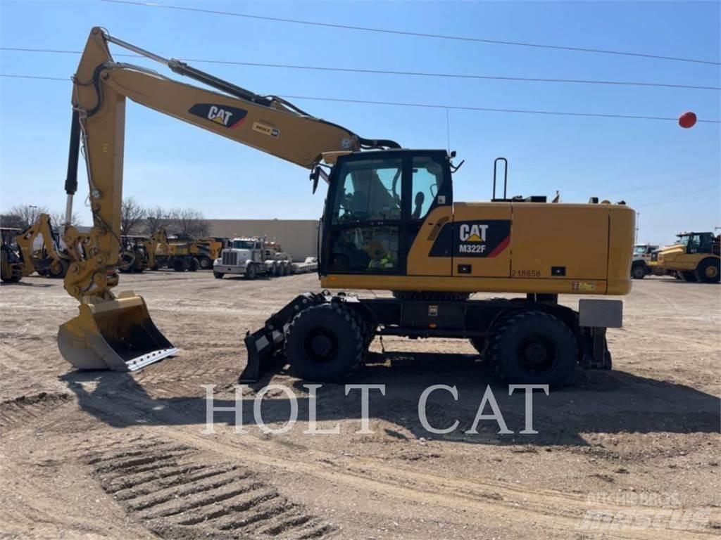 CAT M322F Pelle sur pneus