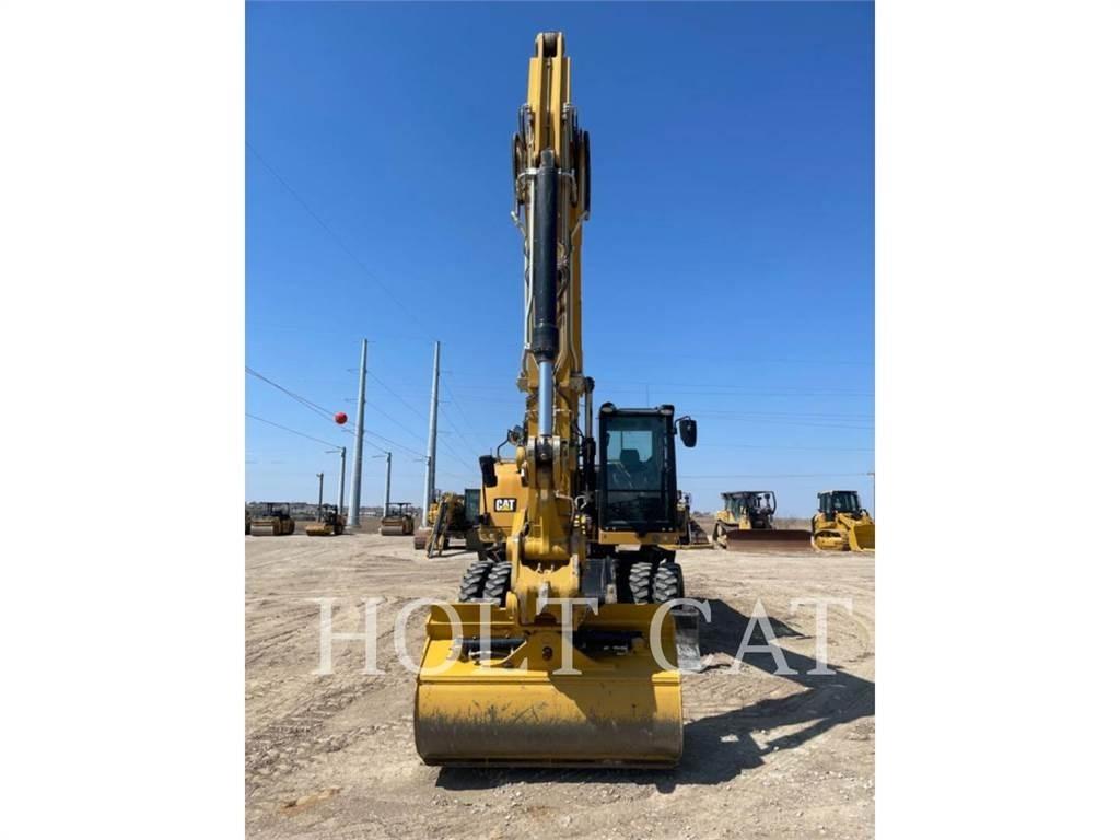 CAT M322F Pelle sur pneus