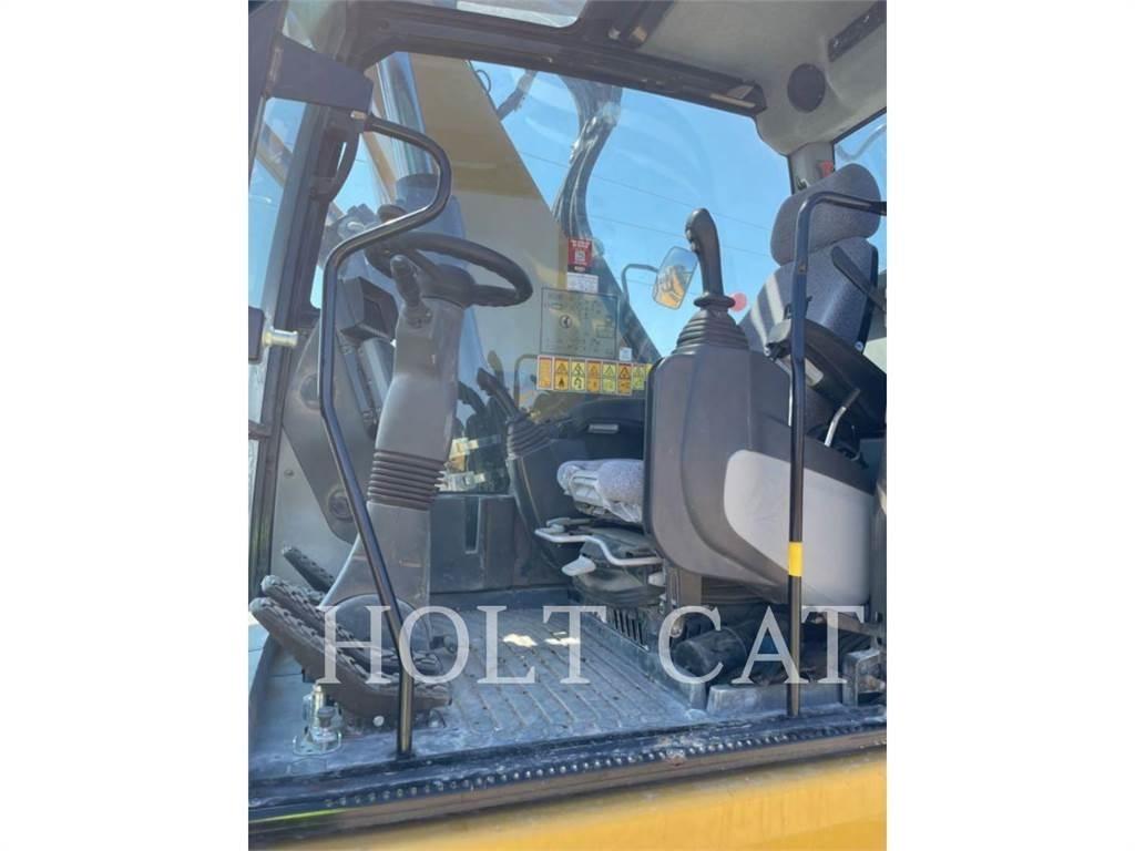 CAT M322F Pelle sur pneus