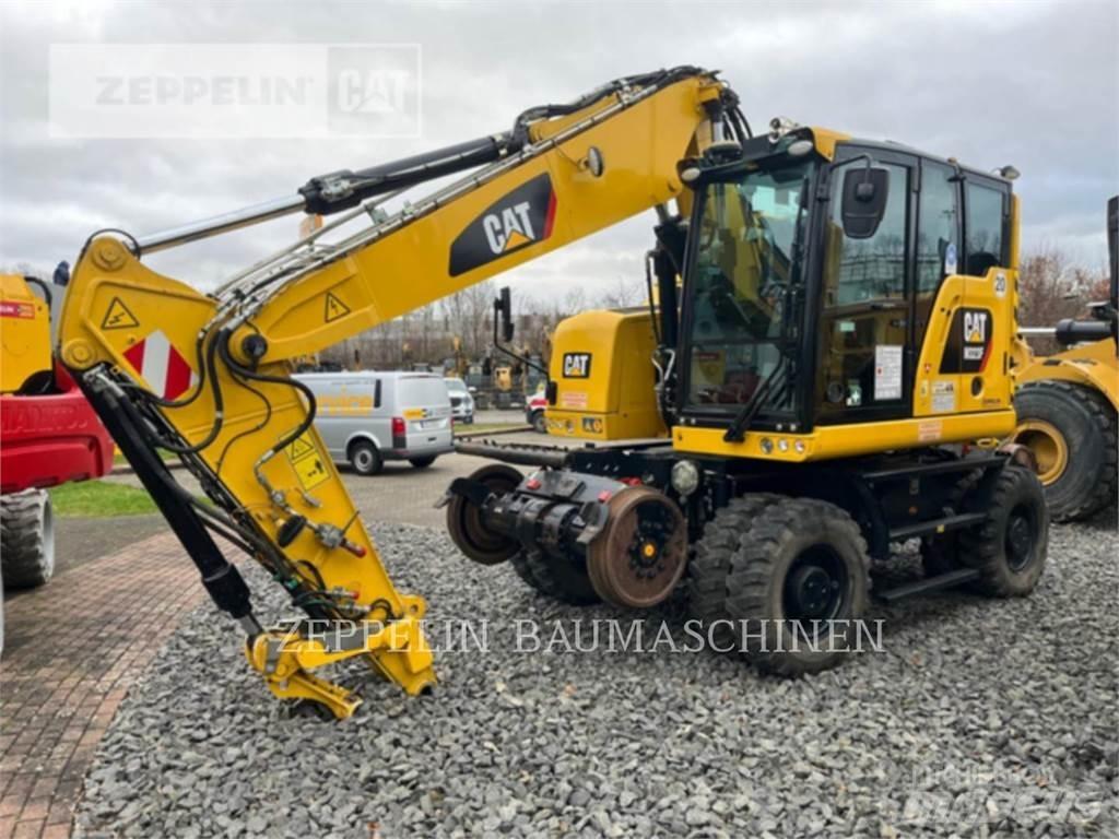 CAT M323F Pelle sur pneus