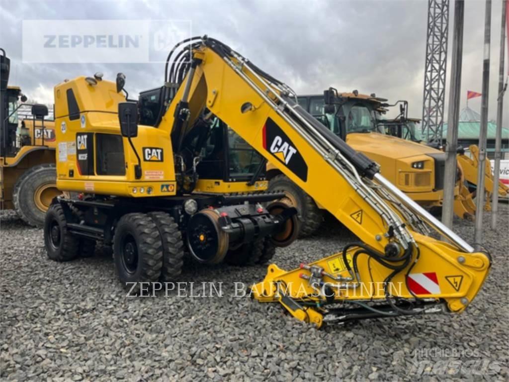 CAT M323F Pelle sur pneus