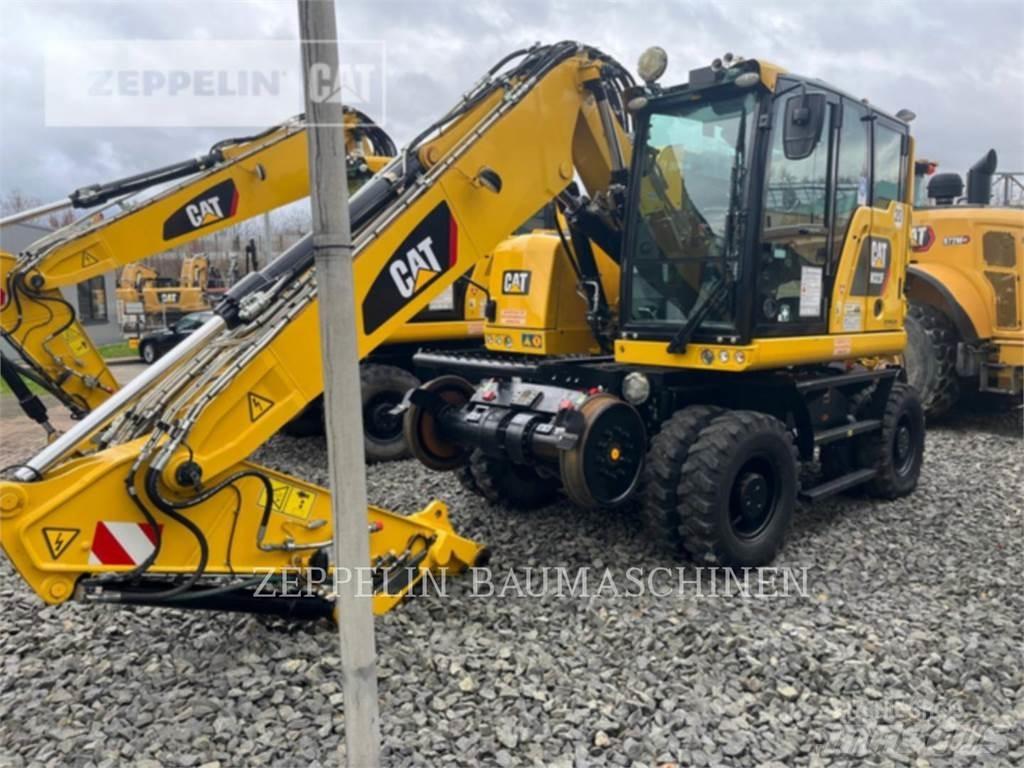 CAT M323F Pelle sur pneus