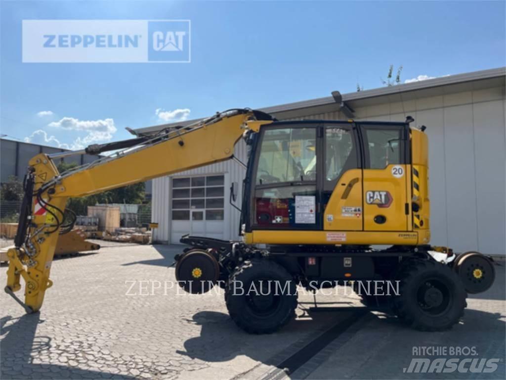 CAT M323F Pelle sur pneus