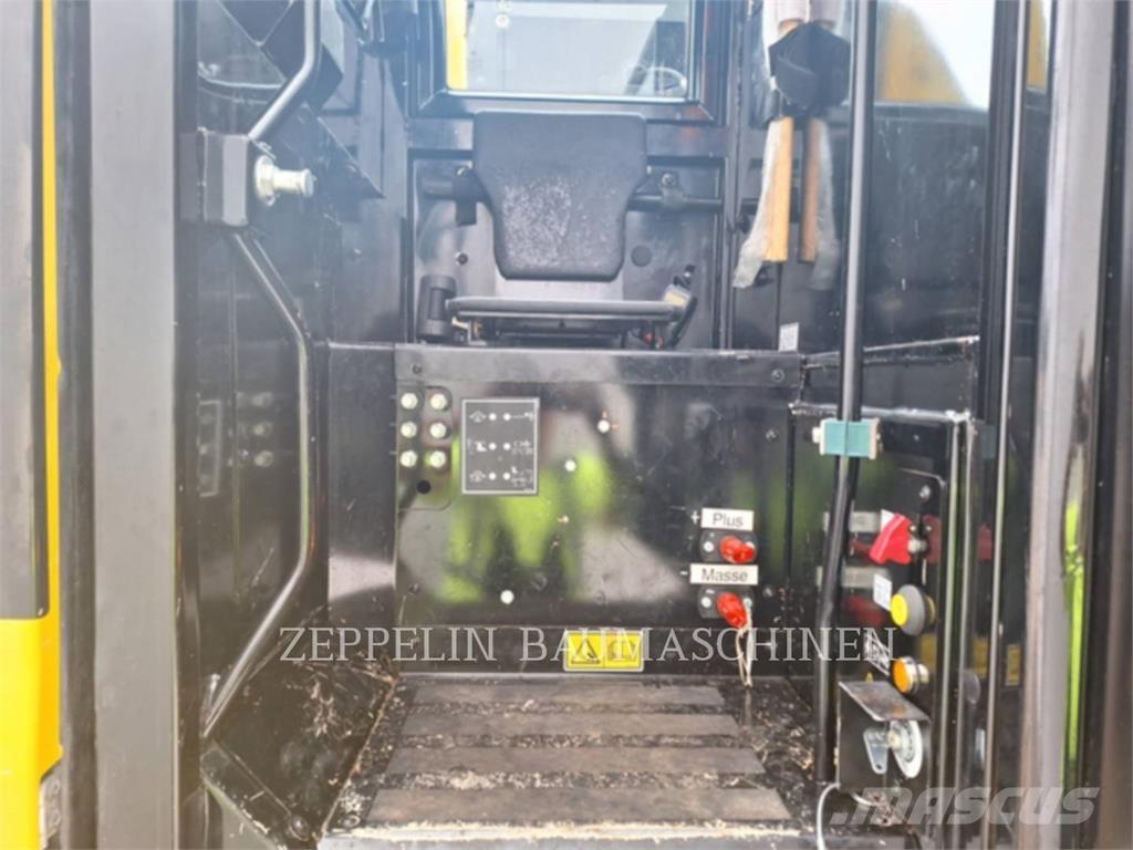 CAT M323F Pelle sur pneus