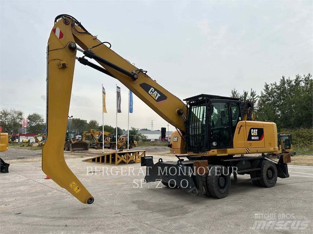 CAT MH3022 Pelle sur pneus