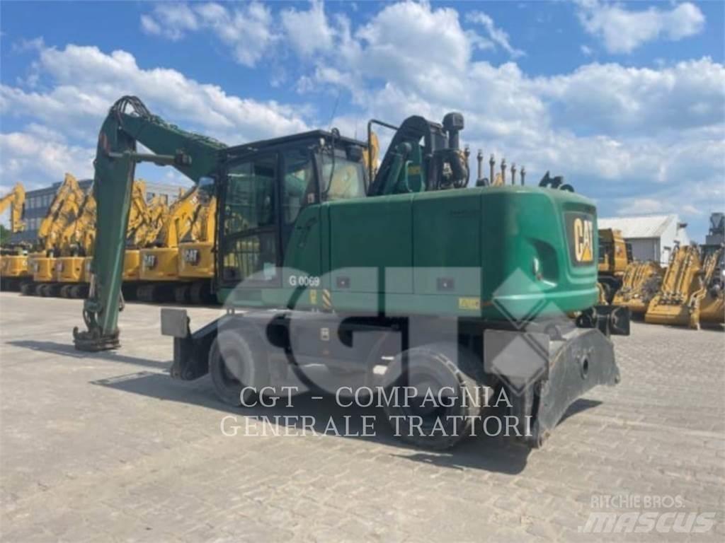 CAT MH3022 Pelle sur pneus