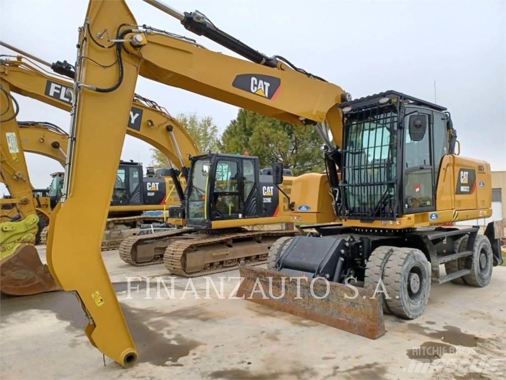 CAT MH3022 Pelle sur pneus