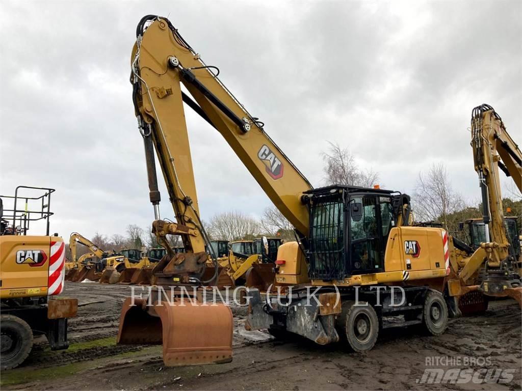 CAT MH3022 Pelle sur pneus