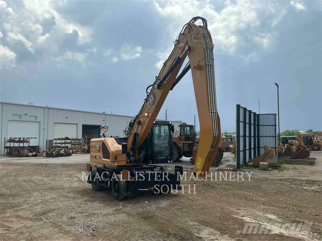 CAT MH3022 Pelle sur pneus
