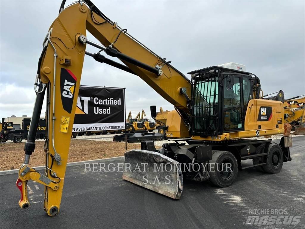 CAT MH3022-1 Pelle sur pneus