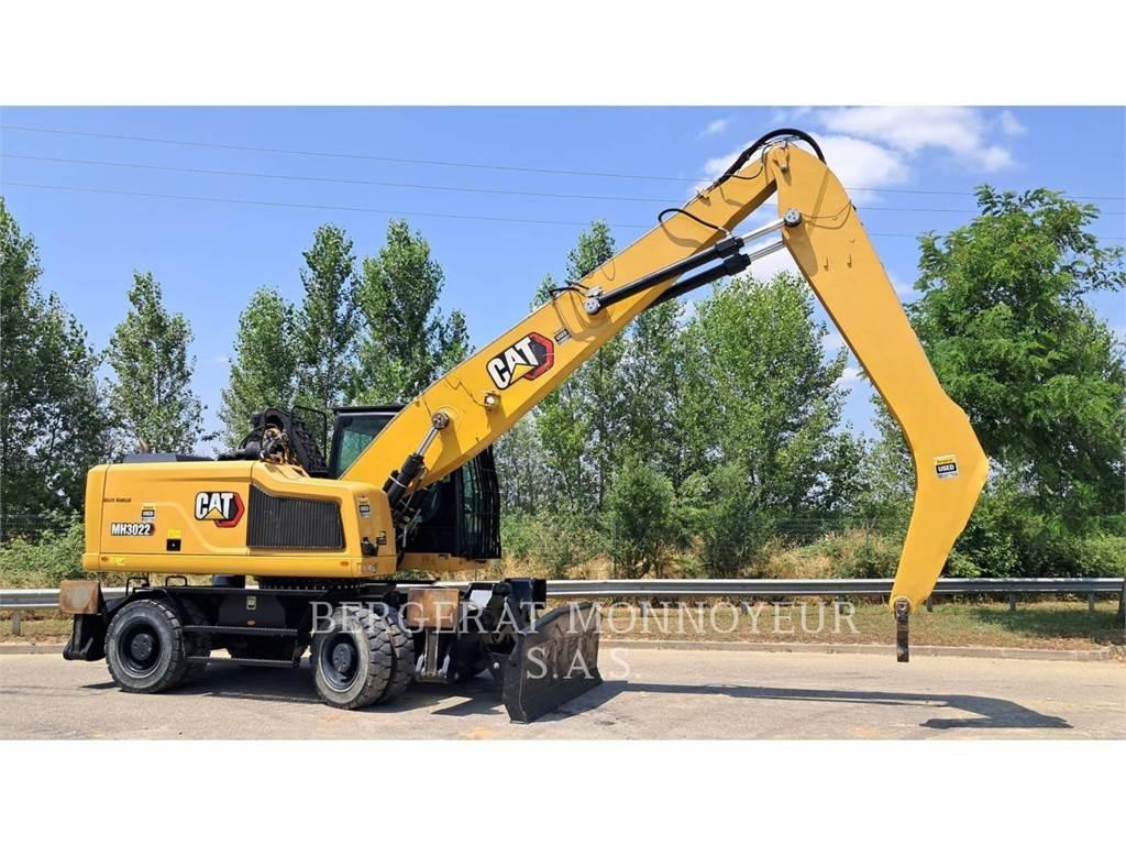 CAT MH3022-1 Pelle sur pneus